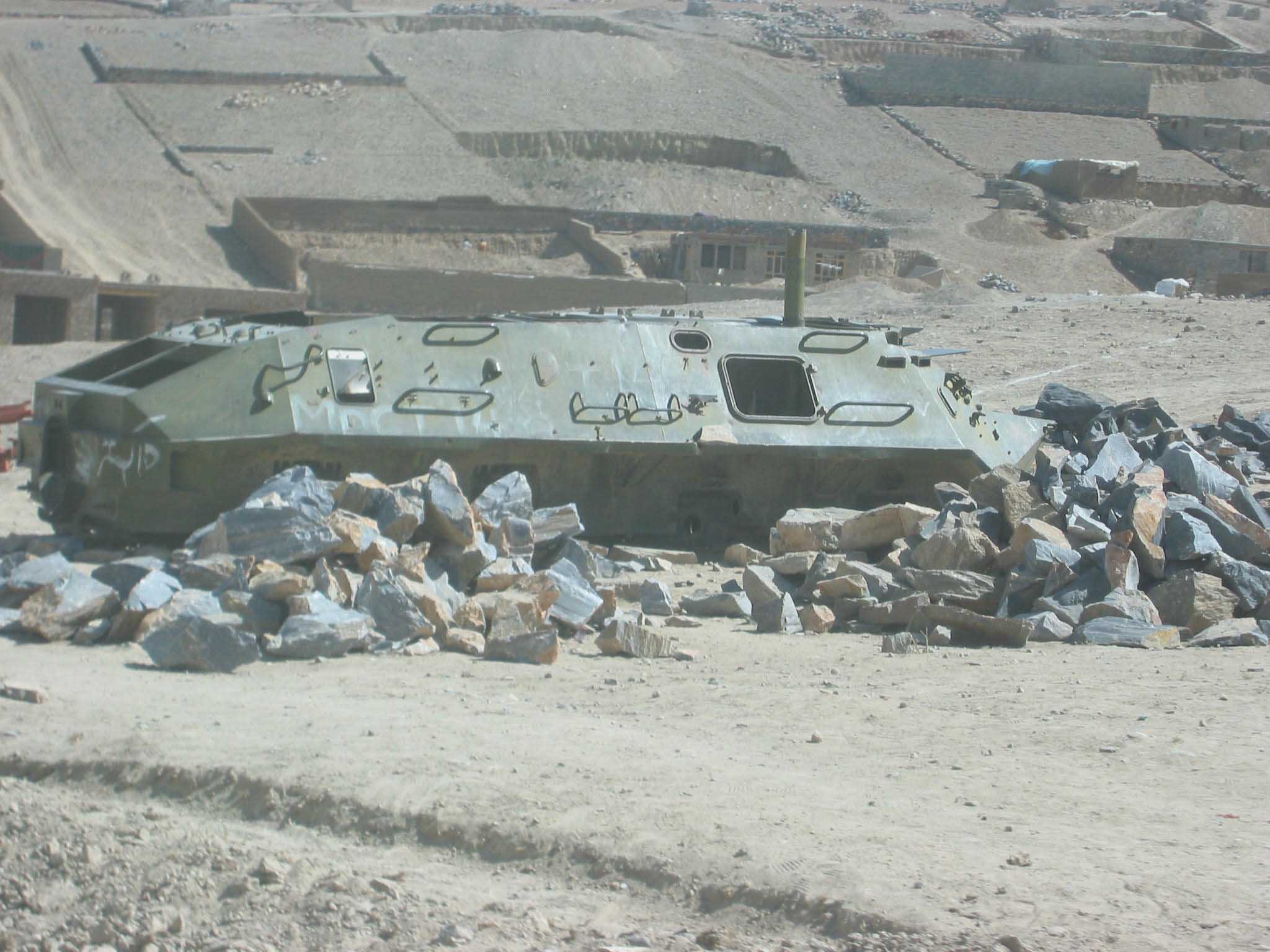 The hull of a Soviet BTR armoured personnel carrier is all that's left after locals in a village near Kabul strip it down for scrap